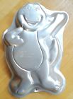 2103-6713 Wilton Barney Cake Pan Alum Purple Dinosaur Waving Copyright
