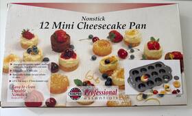 Norpro 768430819943 Nonstick Mini Cheesecake Pan With Handles 12 Count Norpro 768430819943 Nonstick Mini Cheesecake Pan With Handles 12 Count