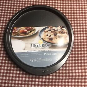 070-02-9808 Wilton Ultra Bake Professional 4 Piece 9inch Non-stick Pizza Pan Set Carbon Steel