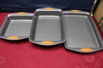 Rachael Ray Set Of 3 Square Pan, Rectangle Cake And Oven Lovin Cookie. Fixed Price $45.00.