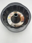 Wilton Baker's Choice Non-stick 9.75-INCH Fluted Tube Pan. Fixed Price $16.99.
