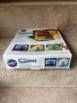 Wilton Checkerboard Cake In Box Set Round, New, 3 Pans And Divider. Fixed Price $12.50.