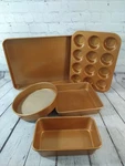 New 5PC Gotham Steel Bakeware Set / Muffin Pan, Cookie Sheet, Bread Round. Fixed Price $46.99.