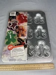 Wilton Bite Size Gingerbread Men Baking Cake Pan 9 Molds **new Sealed**. Fixed Price $14.95.