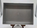 Usa Pan Bakeware 9X13 Rectangle Cake #1110RC-1, Warp Resistant, Nonstick. Fixed Price $22.99.