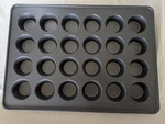 Wilton Perfect Results Premium Non-stick Mega 24 Cup Standard Muffin Pan. Fixed Price $25.00.