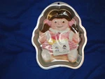 New Wilton Vintage Baby Doll Cake Pan, Stock Number 2105-573. Fixed Price $19.99.