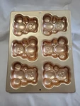 Wilton 2004 Teddy Bear Cake Pan, 6 4"X Molds, Model 2105-4948, Copper Color. Fixed Price $16.45.