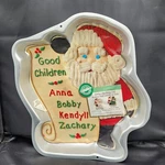 Wilton Santa Checking His List Aluminum Cake Mold Pan Appears New. Fixed Price $15.00.