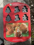 Wilton Whoopie Pans, 12 Cavity Christmas Tree Stocking Gingerbread Man. Fixed Price $39.95.