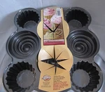 Wilton Cupcake Pans - Small / Mini New Never Used. Fixed Price $54.24.