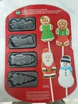 Wilton 8 Cavity Christmas Pops Cookie Pan Santa Stocking Tree Gingerbread Man. Fixed Price $14.00.
