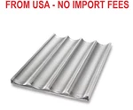 Chicago Metallic 49034 Uni-lock 4-CAVITY Baguette / French Bread Pan. Fixed Price $54.84.