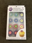 Edible Wilton Multicolor Royal Icing Decorations 1" Flowers Pastel Colors 12 Ct. Fixed Price $15.00.