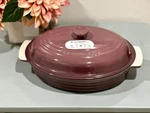 Le Creuset 1.7L Oval Stoneware Dish With Lid - Fig. Fixed Price $125.00.