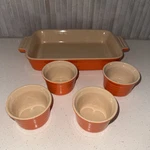 Baking Dish & Four Le Creuset Stoneware Orange Ramekins. Fixed Price $100.00.