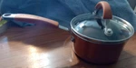 Rachael Ray Non-stick 1 Qt Saucepan Cookware W/glass Lid & Insulated Handles. Fixed Price $12.99.