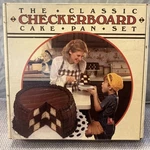 The Classic Checkerboard 9" Cake Pan Set Of 3 Nib. Fixed Price $9.36.