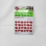 Wilton Heart Dinosaur Silicone Candy Mold New Package. Fixed Price $7.00.