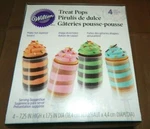 Reduced!!! Nib Wilton Treat Pops 4 Pack Mmmmmmmmmm.....yummy!!!!. Fixed Price $5.29.