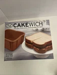 Fred Cakewich Easy-release Silicone Bake Pan Pre-owned. Fixed Price $9.50.