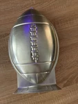 1990 Wilton First And Ten 3-D Football Cake Pan 2105-6504 Silver Color Vintage. Fixed Price $8.00.