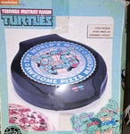 Nickelodeon Teenage Mutant Ninja Turtles Tmnt Electric Pizza Maker Black Blue. Fixed Price $35.99.