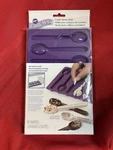 Wilton Chocolate Candy Melts Silicone Spoon Molds 8 Cavities New Nip. Fixed Price $9.99.