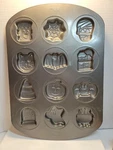 Wilton Halloween 12 Cookie Treat Shapes Pan - Mummy Cat Bat Ghost Spider. Fixed Price $11.99.