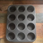 & Metal Products Probake Teflon Xtra Nonstick 12-CUP Gray Muffin Pan. Fixed Price $16.53.