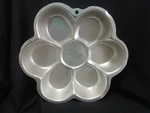 Wilton Flower 6 Petal Cake Pan. Fixed Price $10.00.