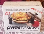 Sealed Vintage 1989 Pyrex Designs Ovenware Party Server Covered Casserole Cradle. Fixed Price $64.95.