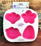 Wilton Silicone Cupcake Mold Girl Power Treat 4 Cavity Kiss Hearts Purse Flower. Fixed Price $30.80.