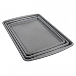 Oster 3 Piece Carbon Steel Cookie Sheet In Greystone. Fixed Price $27.38.