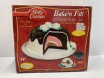 Betty Crocker Bake'n Fill 4 Piece Cake Pan Set. Fixed Price $19.99.