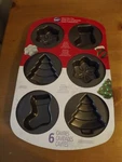 New Wilton Christmas Mini Cake Pan Snowflakes Trees Stockings Nwt. Fixed Price $12.99.