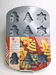 Wilton Non-stick Cookie Pan Holiday Icons 12 Cavity New. Fixed Price $9.95.