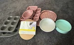 Wilton Non-stick Metal Bakeware Set: Muffin Pan, Cake Pans, 10IN Circles. Fixed Price $46.39.