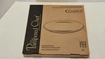 The Pampered Chef 10" Round Baking Stone 1375 New. Fixed Price $29.99.