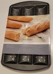 Wilton Baguette French Bread Loaf Pan Perforated Non Stick Carbon Steel 3 Cavity. Fixed Price $16.99.