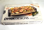 Pyrex Designs 1989 Rectangle Baking Dish Qt & Brass Carrier Cradle 2331-F. Fixed Price $18.91.