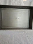 Usa Pan Bakeware 9X13 Rectangle Cake #1110RC-1, Warp Resistant, Nonstick. Fixed Price $28.99.