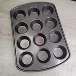 Wilton Muffin Pan Perfect Results Non Stick 12 Cup Premium Lightly Used. Fixed Price $24.95.