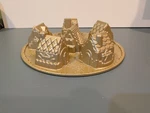 Nordic Ware Cozy Village Pan Cast Aluminum 6-CUP Gold Holiday Cake Baking Mold. Fixed Price $18.39.