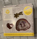 New Wilton Cookie Kit With Unicorn, Star Cutters, Decorating Bags & Tips. Fixed Price $6.00.