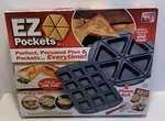 Ez Pockets 4-PIECE Non-stick Baking Kit With Cutting Tool & Recipe Book. Fixed Price $18.99.
