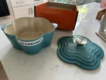 New In Box Creuset Flower Cocotte Enamelled Cast Iron Caribbean Blue. Fixed Price $329.00.