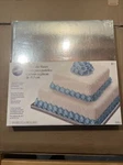 Wilton Silver Foiled 14-INCH Wrapped Bases For Cakes, 2 Count. Fixed Price $19.99.