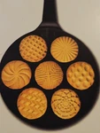 Crofton Pancake Non-stick Aluminum Black, 7 Designs, Round, Easy Clean. Fixed Price $18.98.
