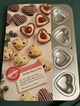 2- Wilton Petite Heart Cake/treat Pans. Fixed Price $10.00.